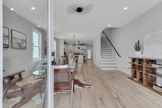 6376A Ivy St, Nashville, TN 37209 - interior space featuring recessed lighting, stairs, light wood finished floors, baseboards, and a notable chandelier