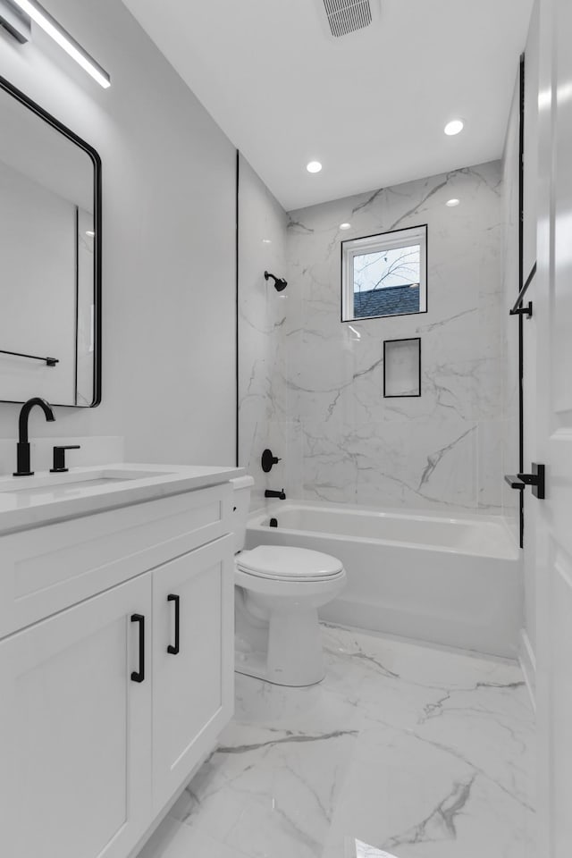6376A Ivy St, Nashville, TN 37209 - bathroom with vanity,  shower combination, toilet, visible vents, and marble finish floor