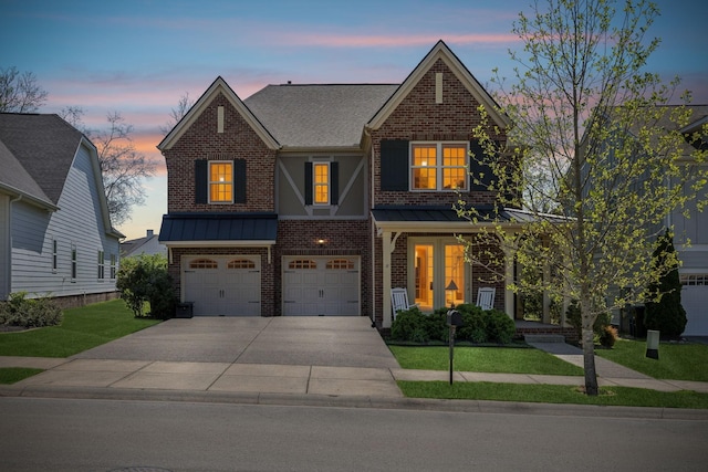 7025 Headwaters Dr, Franklin, TN 37064 - view of front of property featuring brick siding, metal roof, a standing seam roof, and concrete driveway