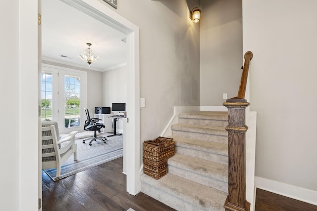 7025 Headwaters Dr, Franklin, TN 37064 - stairs featuring baseboards, ornamental molding, a chandelier, visible vents, and wood finished floors