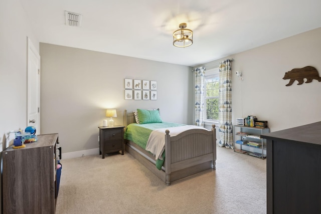 7025 Headwaters Dr, Franklin, TN 37064 - bedroom with visible vents, baseboards, and light carpet
