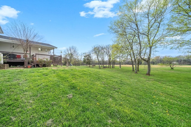 view of yard featuring a deck