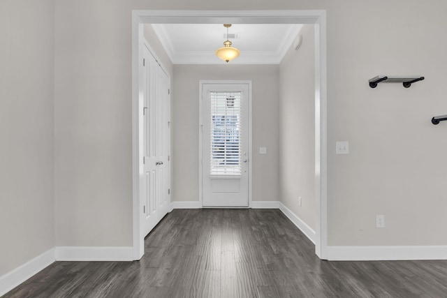 entrance foyer with baseboards, visible vents, dark wood-style flooring, and ornamental molding