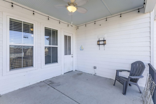 view of patio featuring ceiling fan