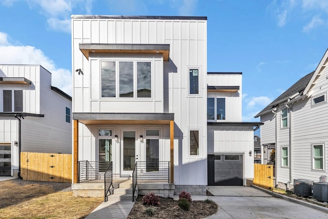 6376B Ivy St, Nashville, TN 37209 - contemporary home with an attached garage, board and batten siding, fence, central air condition unit, and a gate