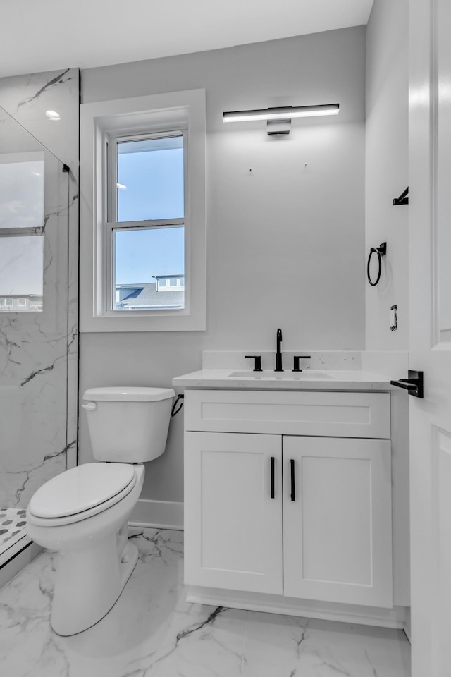 6376B Ivy St, Nashville, TN 37209 - bathroom featuring a marble finish shower, toilet, marble finish floor, and vanity