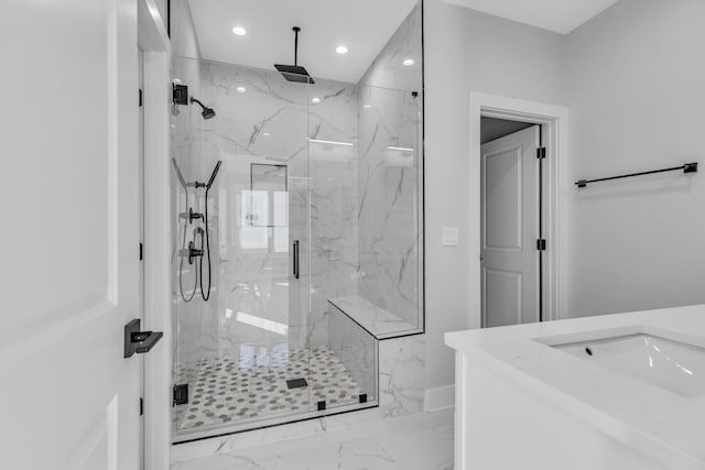6376D Ivy St, Nashville, TN 37209 - full bathroom featuring recessed lighting, marble finish floor, a sink, and a marble finish shower