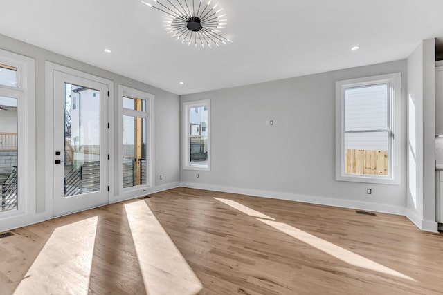 6376D Ivy St, Nashville, TN 37209 - interior space with a notable chandelier, baseboards, recessed lighting, light wood-style flooring, and visible vents