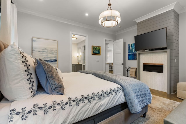 113 Cheekwood Ter, Nashville, TN 37205 - bedroom featuring recessed lighting, wood finished floors, a chandelier, a fireplace, and crown molding