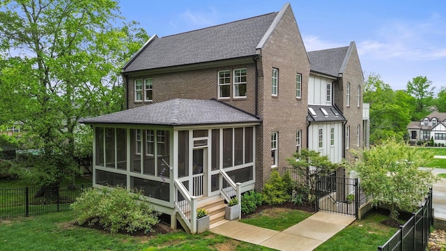 113 Cheekwood Ter, Nashville, TN 37205 - rear view of property with a shingled roof, fence, a yard, brick siding, and a sunroom