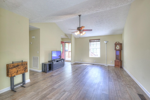 109 Spring Valley Ct, Cross Plains, TN 37049 - unfurnished living room with wood finished floors, visible vents, baseboards, a textured ceiling, and ceiling fan