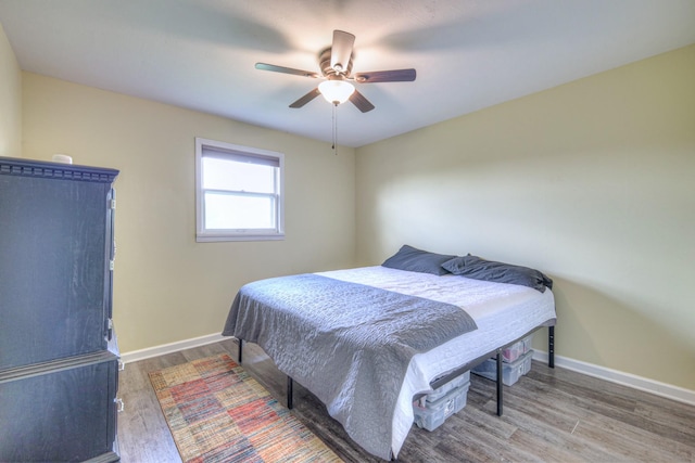 109 Spring Valley Ct, Cross Plains, TN 37049 - bedroom with baseboards, a ceiling fan, and wood finished floors