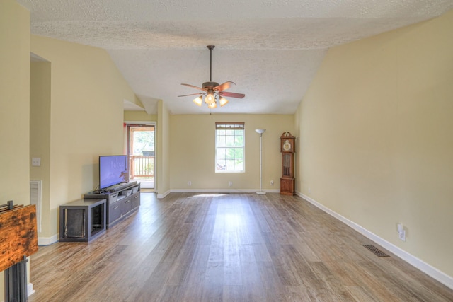 109 Spring Valley Ct, Cross Plains, TN 37049 - unfurnished living room with wood finished floors, visible vents, a textured ceiling, and ceiling fan