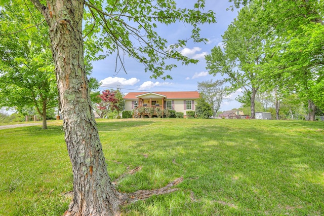 109 Spring Valley Ct, Cross Plains, TN 37049 - view of front of house featuring a wooden deck and a front yard