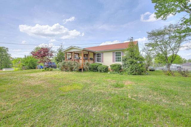 109 Spring Valley Ct, Cross Plains, TN 37049 - ranch-style home with fence, a front lawn, and covered porch