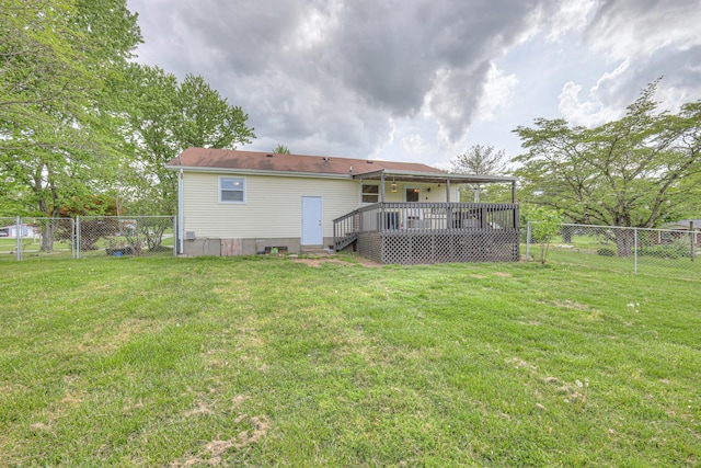 109 Spring Valley Ct, Cross Plains, TN 37049 - back of property with a wooden deck, a yard, and a fenced backyard