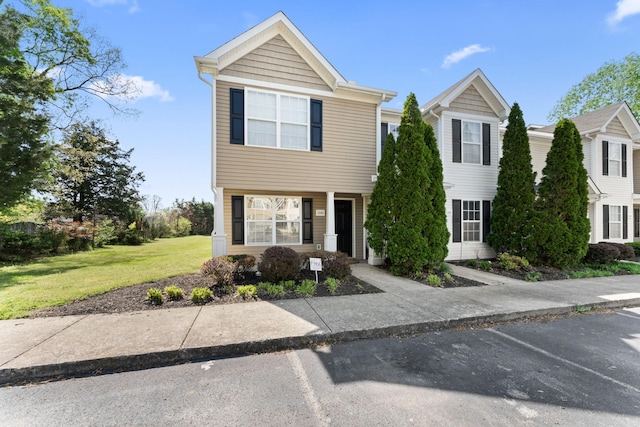 1303 Vermont Ct, Murfreesboro, TN 37130 - view of front facade featuring a front yard and uncovered parking