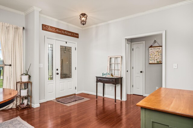 entrance foyer with dark wood-style flooring, baseboards, and ornamental molding