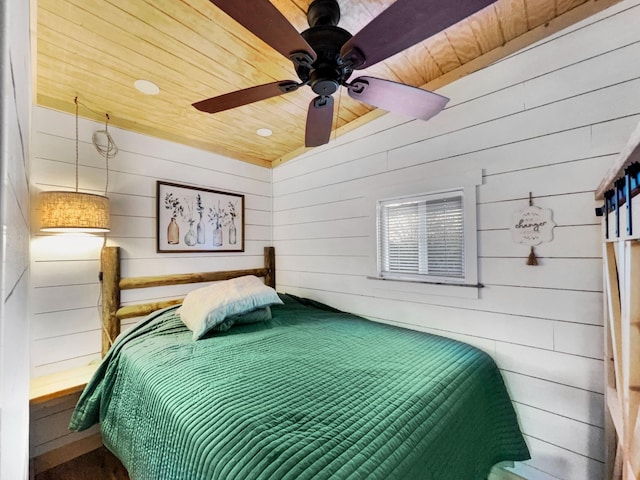 bedroom featuring recessed lighting, wood walls, wooden ceiling, and ceiling fan