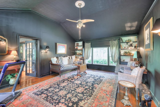 1143 Carnton Ln, Franklin, TN 37064 - living area featuring ornamental molding, vaulted ceiling, a ceiling fan, and wood finished floors