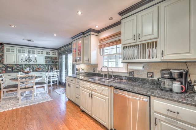 1143 Carnton Ln, Franklin, TN 37064 - kitchen featuring stainless steel dishwasher, a wealth of natural light, a notable chandelier, and a sink