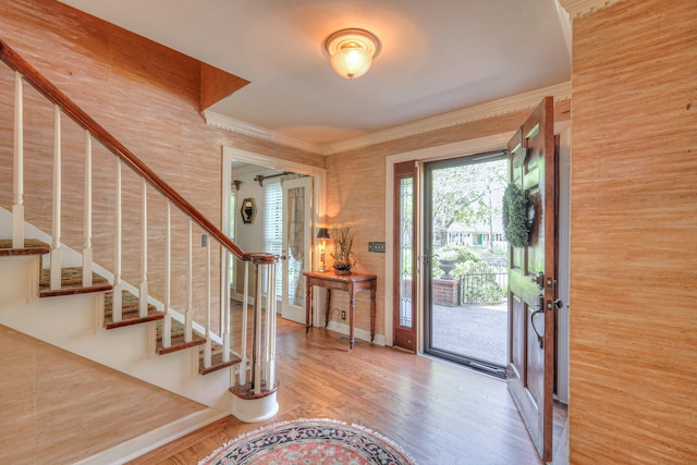 1143 Carnton Ln, Franklin, TN 37064 - entrance foyer with wood finished floors, baseboards, ornamental molding, and stairway