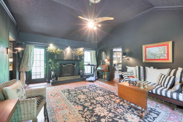 1143 Carnton Ln, Franklin, TN 37064 - living area featuring a ceiling fan, a fireplace with raised hearth, wood finished floors, and lofted ceiling