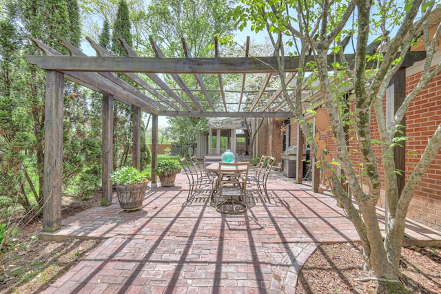 1143 Carnton Ln, Franklin, TN 37064 - view of patio / terrace featuring a grill, outdoor dining space, and a pergola