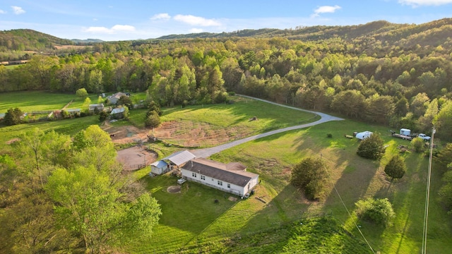 aerial view with a view of trees and a rural view