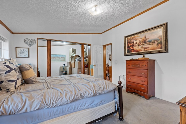bedroom with a textured ceiling, light colored carpet, and ornamental molding