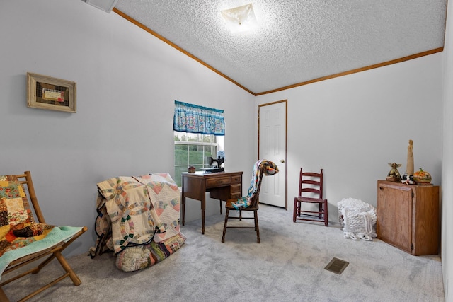 office with visible vents, carpet, a textured ceiling, crown molding, and vaulted ceiling