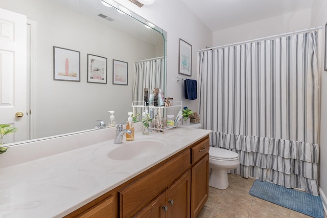bathroom with a shower with shower curtain, vanity, tile patterned flooring, toilet, and visible vents
