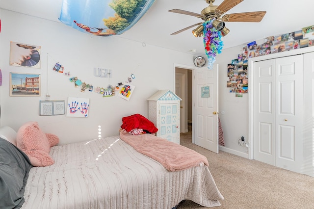 bedroom featuring a closet, carpet flooring, and a ceiling fan