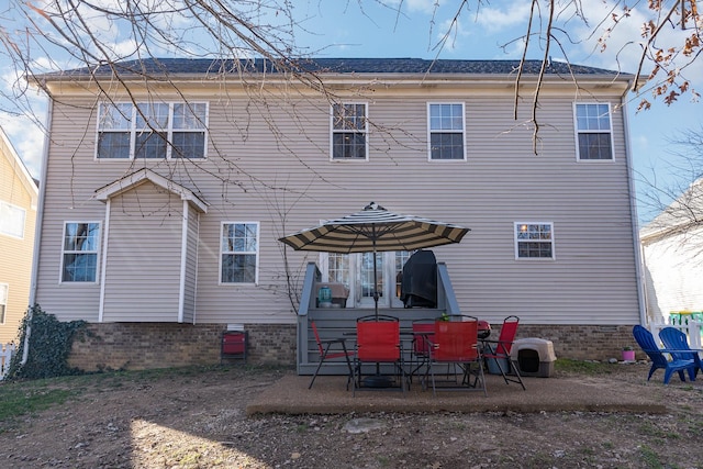 rear view of house featuring a patio area