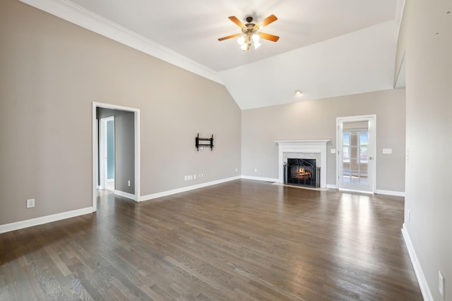 unfurnished living room with ceiling fan, a fireplace, dark wood finished floors, baseboards, and lofted ceiling