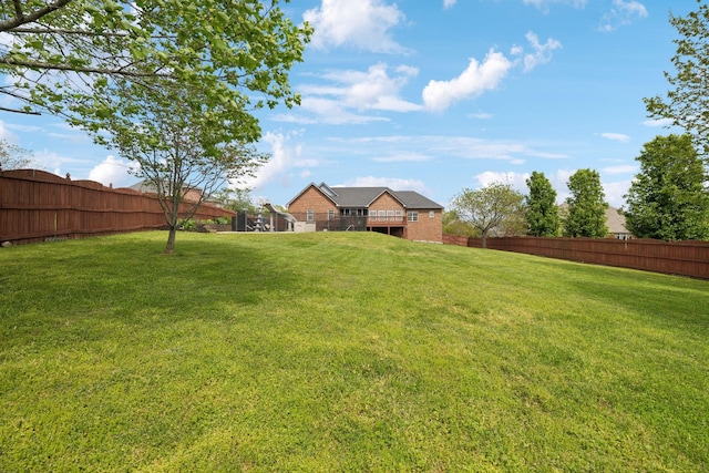 view of yard featuring a fenced backyard