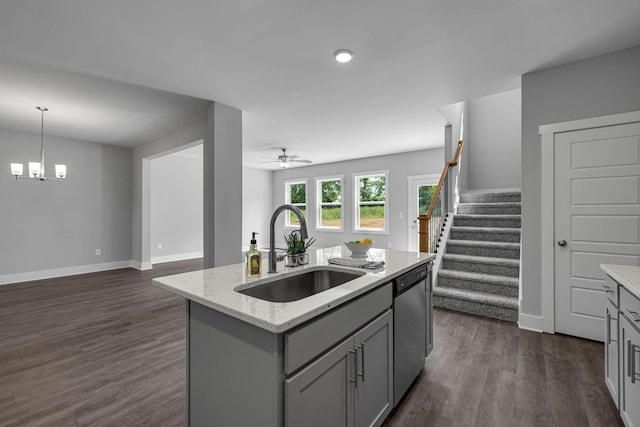 558 Twyla Dr, Lebanon, TN 37087 - kitchen featuring gray cabinetry, stainless steel dishwasher, open floor plan, and dark wood-style flooring