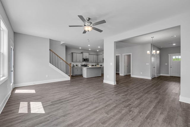 558 Twyla Dr, Lebanon, TN 37087 - unfurnished living room with ceiling fan, dark wood-style floors, a chandelier, and recessed lighting