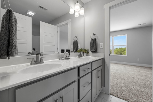 558 Twyla Dr, Lebanon, TN 37087 - bathroom featuring double vanity and marble look tiles