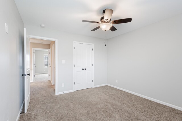 133 Kildeer Dr, Clarksville, TN 37040 - unfurnished bedroom with a closet, carpet, baseboards, and a ceiling fan