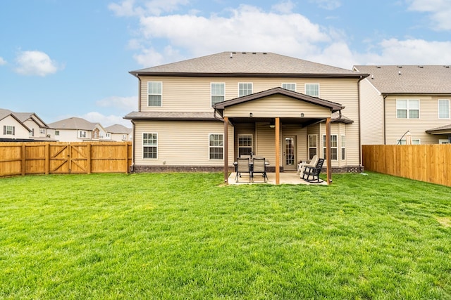 133 Kildeer Dr, Clarksville, TN 37040 - back of house with a fenced backyard, a patio area, and a lawn