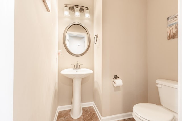 133 Kildeer Dr, Clarksville, TN 37040 - bathroom with toilet, tile patterned flooring, and baseboards