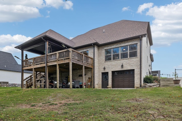 rear view of house with stairway, brick siding, a garage, a yard, and a deck
