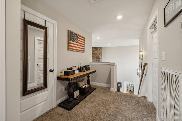 carpeted office featuring baseboards, visible vents, and recessed lighting