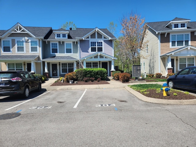 view of front of home with uncovered parking