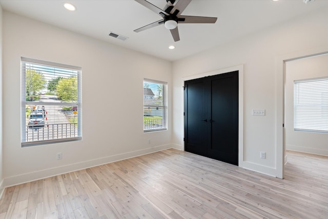 416 Mercomatic Dr, Nashville, TN 37209 - unfurnished bedroom with recessed lighting, light wood finished floors, visible vents, and baseboards