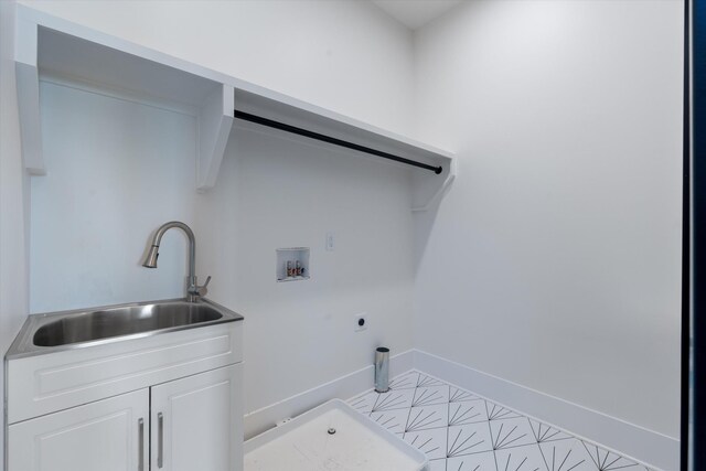 416 Mercomatic Dr, Nashville, TN 37209 - clothes washing area with a sink, baseboards, hookup for an electric dryer, and washer hookup