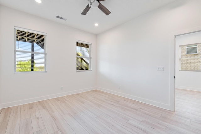 416 Mercomatic Dr, Nashville, TN 37209 - unfurnished room with light wood-style floors, a ceiling fan, visible vents, and plenty of natural light