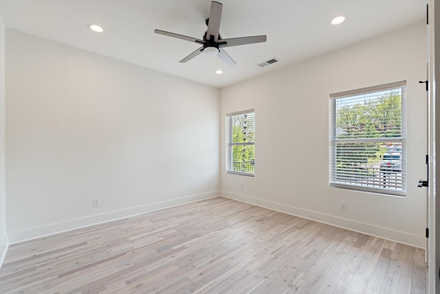 416 Mercomatic Dr, Nashville, TN 37209 - spare room with light wood-type flooring, a ceiling fan, visible vents, recessed lighting, and baseboards