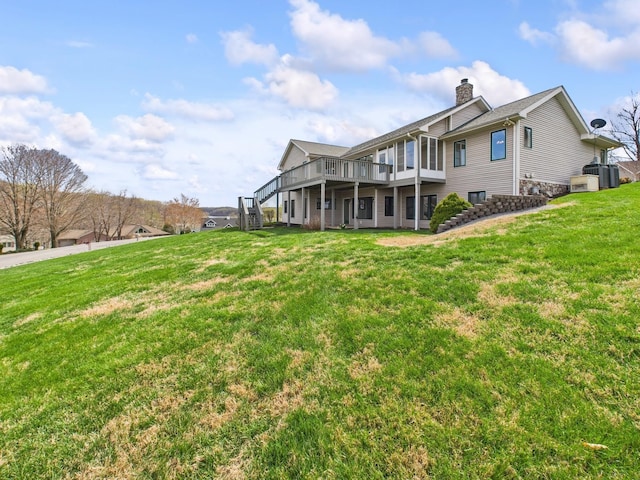 250 Sun Hill Cir, Cadiz, KY 42211 - view of side of home with a yard, a wooden deck, stairs, and a chimney